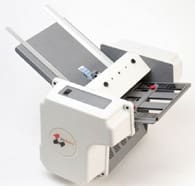 A white and black paper cutter machine, showcasing its functionality for trimming and cutting paper efficiently.